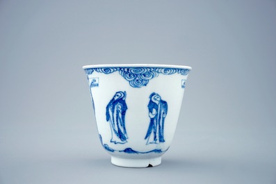 A blue and white Chinese cup and saucer with "The crucifixion", Kangxi