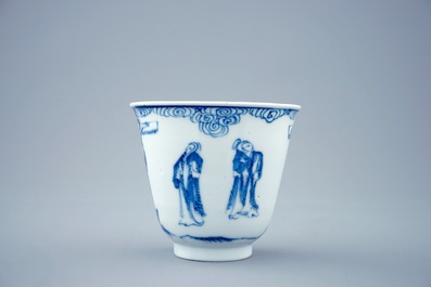 A blue and white Chinese cup and saucer with "The crucifixion", Kangxi