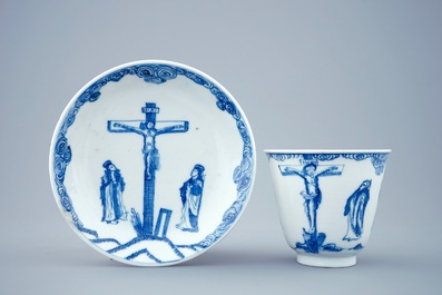 A blue and white Chinese cup and saucer with "The crucifixion", Kangxi