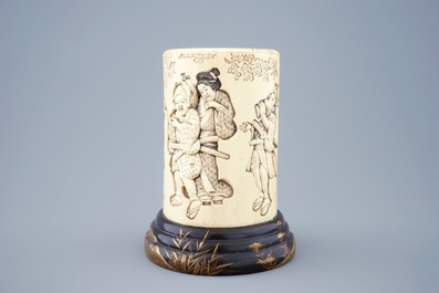 A Japanese carved and signed ivory brushpot on gilt-lacquered stand, Meiji, 19th C.