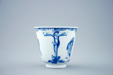 A blue and white Chinese cup and saucer with "The crucifixion", Kangxi