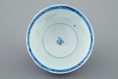 A blue and white Chinese cup and saucer with a sage on a donkey, Kangxi