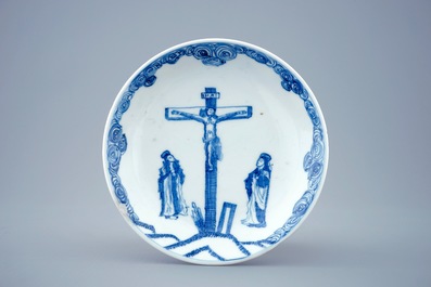 A blue and white Chinese cup and saucer with "The crucifixion", Kangxi