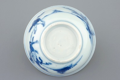 A blue and white Chinese cup and saucer with a sage on a donkey, Kangxi