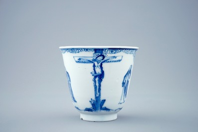 A blue and white Chinese cup and saucer with "The crucifixion", Kangxi