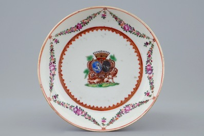 A Chinese famille rose armorial cup and saucer, Qianlong, 18th C.
