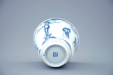 A blue and white Chinese cup and saucer with "The crucifixion", Kangxi
