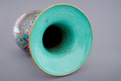 A massive Chinese famille rose on blue ground vase with a court scene, 19th C.