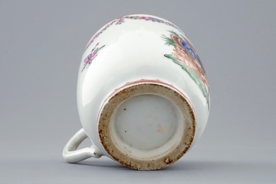 A Chinese famille rose armorial cup and saucer, Qianlong, 18th C.