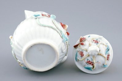 A Chinese relief-decorated famille rose jug and cover, Yongzheng, 1723-1735
