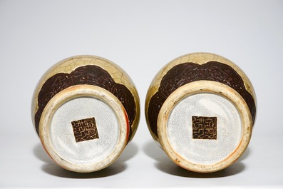 A pair of Chinese crackle glazed caf&eacute; au lait ground Nanking vases, 19th C.