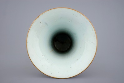 A tall Chinese famille rose powder blue ground vases, Qianlong, 18th C.