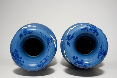 A pair of tall Chinese lavender blue ground vases with auspicious symbols, 19th C.