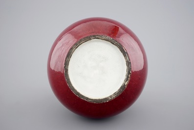 A Chinese monochrome red bottle vase mounted as a lamp, 19th C.