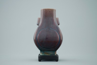 A Chinese monochrome aubergine fanghu shape vase, 19th C.