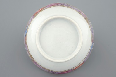 A fine gilt-ground Chinese famille rose mandarin cup and saucer, Qianlong, 18th C.