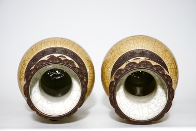 A pair of Chinese crackle glazed caf&eacute; au lait ground Nanking vases, 19th C.