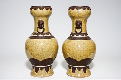 A pair of Chinese crackle glazed caf&eacute; au lait ground Nanking vases, 19th C.