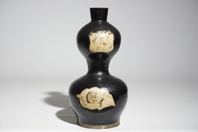 A Chinese black-glazed cizhou double gourd vase, Yuan or Ming