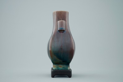 A Chinese monochrome aubergine fanghu shape vase, 19th C.