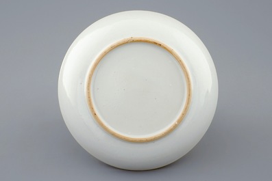 A Chinese famille rose cup and saucer with cherubs, Qianlong, 18th C.