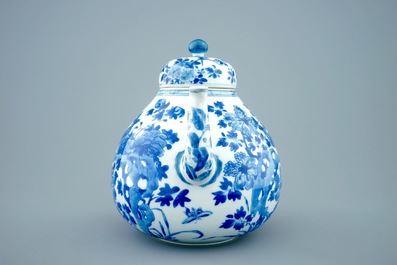 A large Chinese blue and white teapot and cover with peacocks, Kangxi