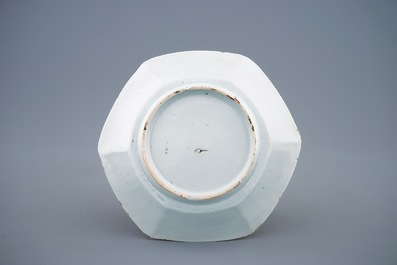 A Chinese famille rose hexagonal covered cup and saucer, Qianlong, 18th C.