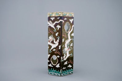 A Chinese black ground open worked hat stand with dragons, 19th C.