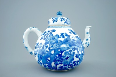 A large Chinese blue and white teapot and cover with peacocks, Kangxi