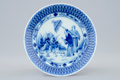 A Chinese blue and white cup and saucer with "La Dame au Parasol" after Pronk, ca. 1740