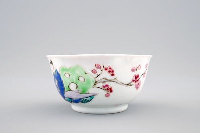 Een Chinese famille rose eierschaal kop en schotel met een tuinsc&egrave;ne, Yongzheng, 1723-1735
