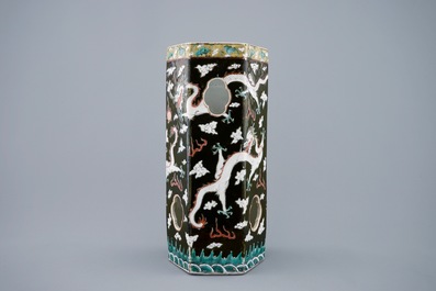 A Chinese black ground open worked hat stand with dragons, 19th C.