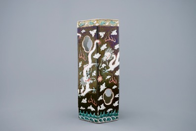 A Chinese black ground open worked hat stand with dragons, 19th C.