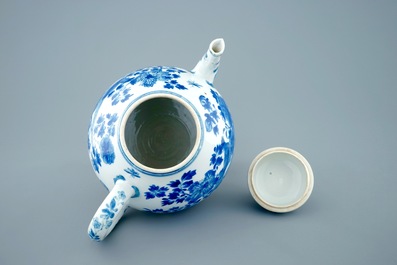 A large Chinese blue and white teapot and cover with peacocks, Kangxi