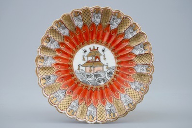 A Chinese relief-decorated grisaille and iron red cup and saucer with matching bowl, Yongzheng, 1723-1735
