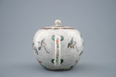 A Chinese famille verte crackle glazed ground teapot and cover, Kangxi