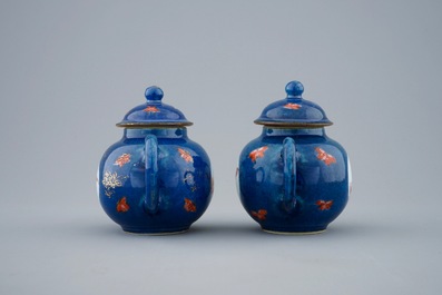 A pair of small Chinese powder blue teapots with roosters, Kangxi