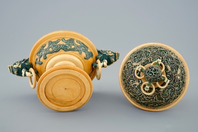 A Chinese polychrome ivory censer with cover on wooden base, 19th C.