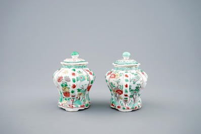A pair of Chinese famille verte teapots and covers, Kangxi