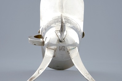 A pair of Chinese silver archaic "Jue" wine cups marked for Heng Li, Tientsin, 19th C.