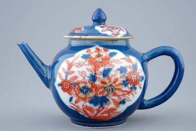 A Chinese powder blue and iron red decorated teapot and cover, Kangxi