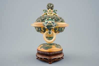 A Chinese polychrome ivory censer with cover on wooden base, 19th C.