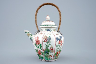 A Chinese famille verte teapot and cover with replacement handle, Kangxi