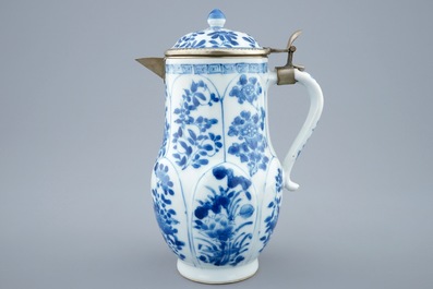 A Chinese blue and white jug and cover, Kangxi