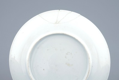 A pair of Chinese grisaille and gilt eggshell cups and saucers with Europeans, Yongzheng, 1723-1735