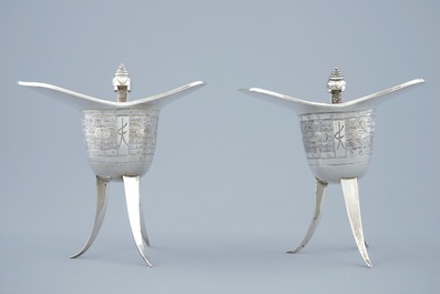 A pair of Chinese silver archaic "Jue" wine cups marked for Heng Li, Tientsin, 19th C.