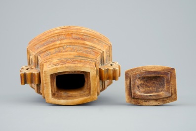 A Chinese parcel-gilt ivory vase and cover on wooden stand, 19th C.