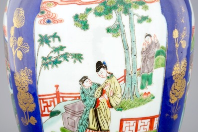 A Chinese famille verte powder blue ground vase and cover, 19th C.
