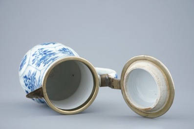 A Chinese blue and white jug and cover, Kangxi