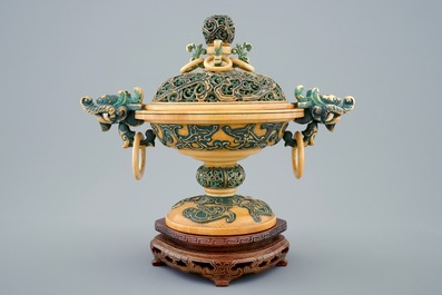 A Chinese polychrome ivory censer with cover on wooden base, 19th C.